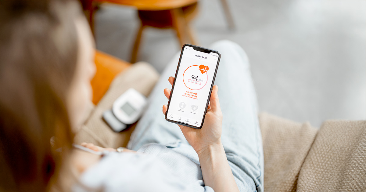 Woman reviewing health results on her phone during GLP-1 treatment